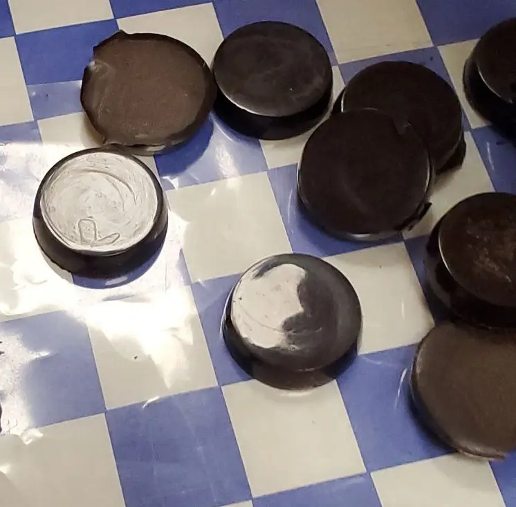 Light reflecting off the hot chocolate disks.